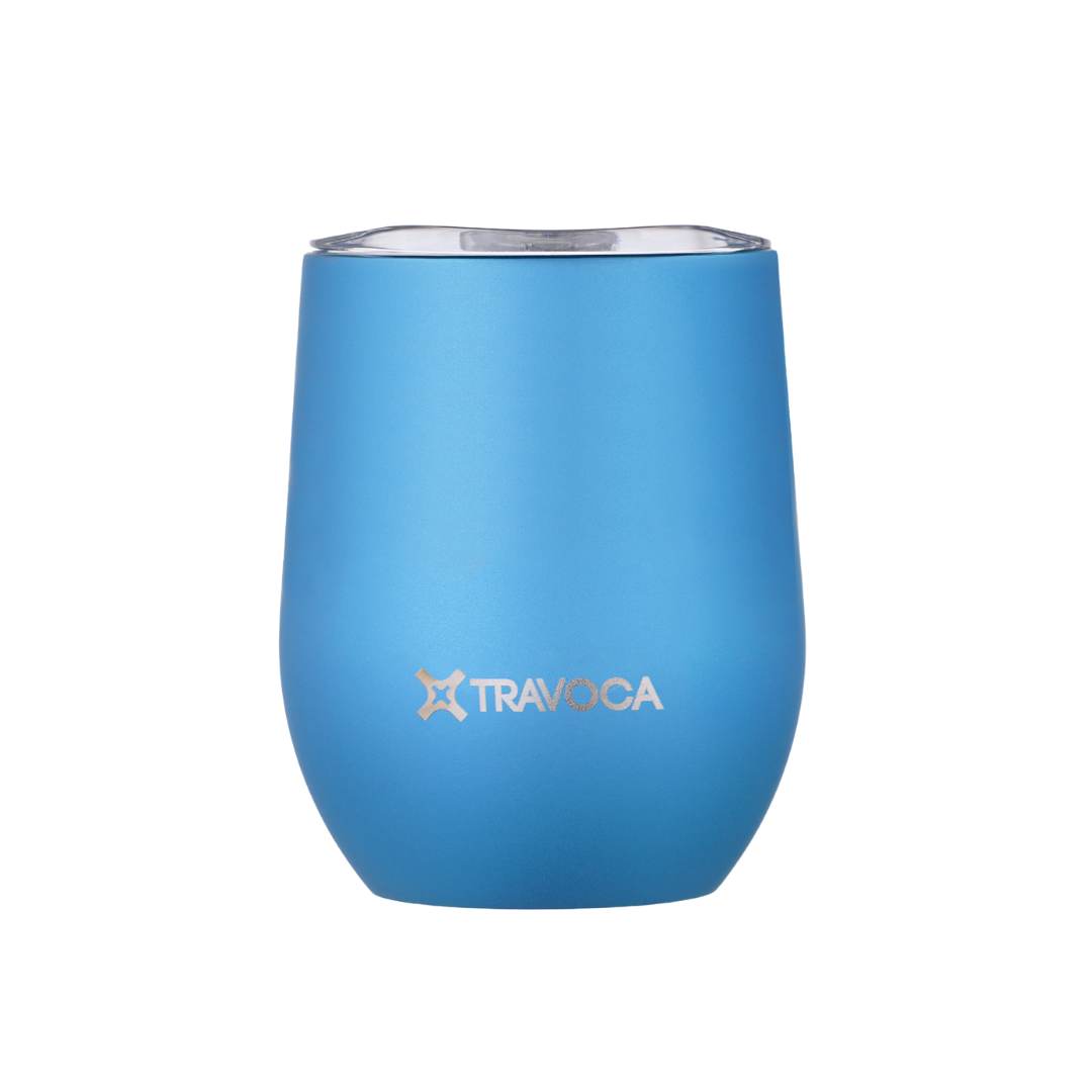 TRAVOCA Gemma cornflower blue double-wall titanium tumbler with BPA-free spill-proof lid, lightweight and durable drinkware for travel and outdoor use.
